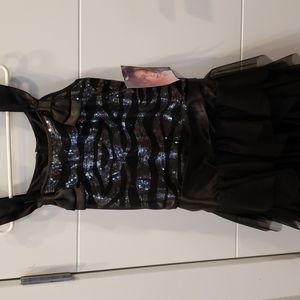 Brand: Biscotti Size:10 Color: Black (Never worn)